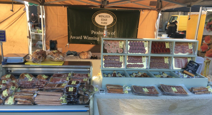 Wenlock Edge Farm's stall at a farmers market